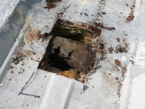 Why Is My Metal Roof Leaking? | Benchmark, Inc. Cedar Rapids, IA
