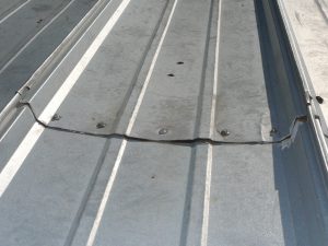 Why Is My Metal Roof Leaking? | Benchmark, Inc. Cedar Rapids, IA