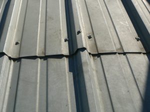 Why Is My Metal Roof Leaking? | Benchmark, Inc. Cedar Rapids, IA