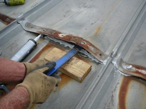 Why Is My Metal Roof Leaking? | Benchmark, Inc. Cedar Rapids, IA